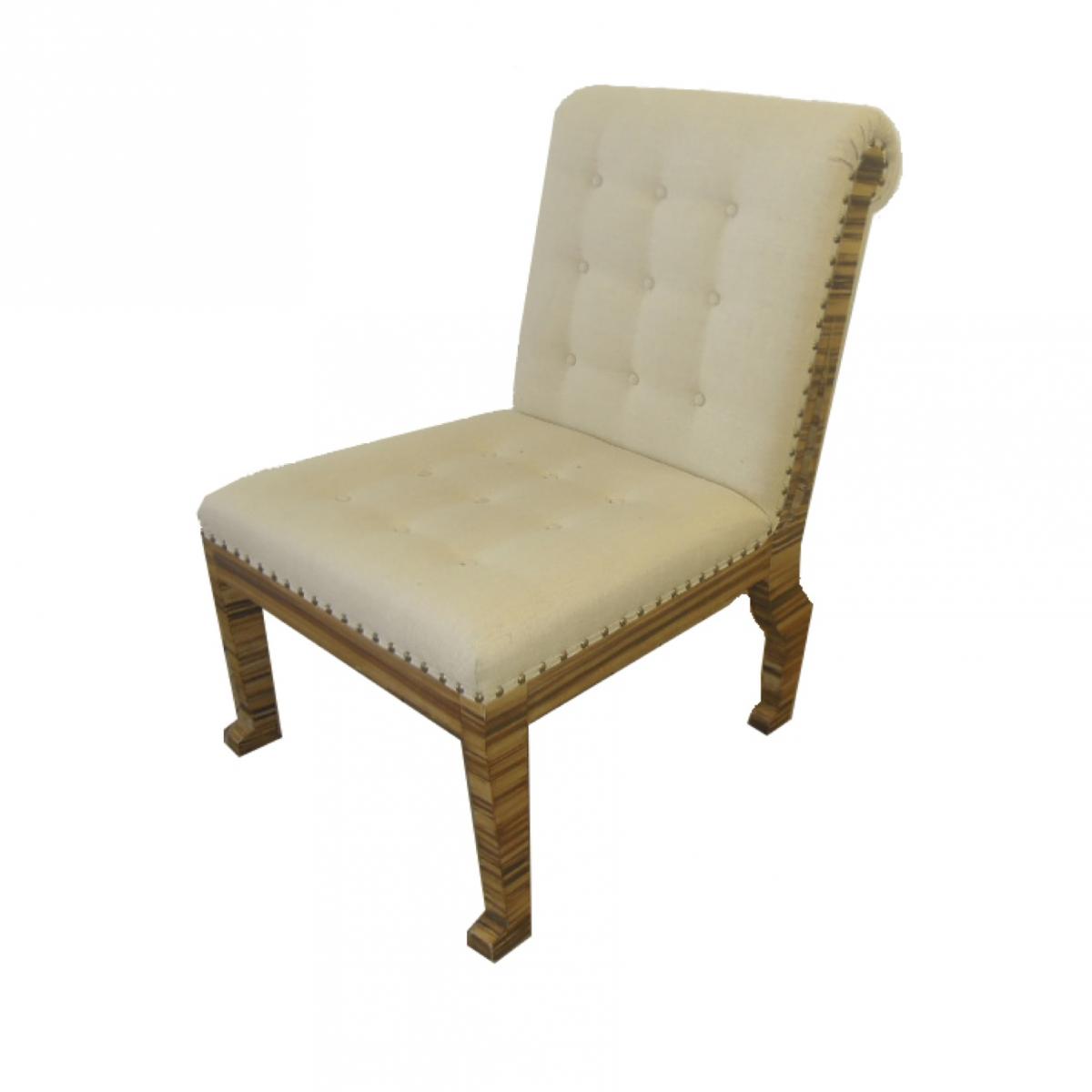 Armless chair reupholstered in cream fabric with tufting