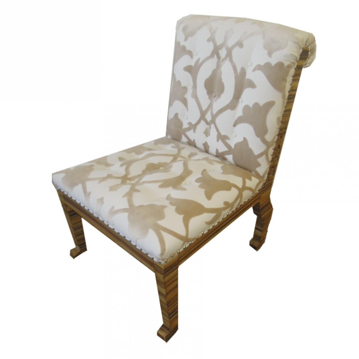 Armless chair reupholstered in cream fabric with tufting