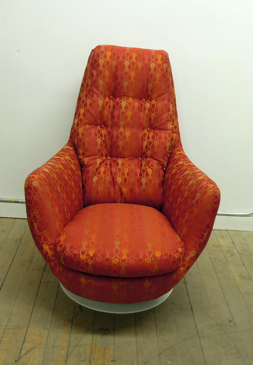Armless modern chair reuphosltered in orange fabric